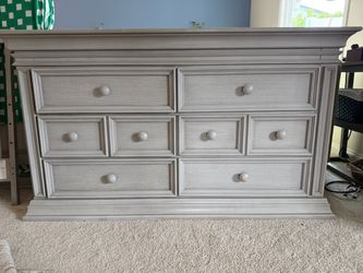 Grey wood grain crib and dresser