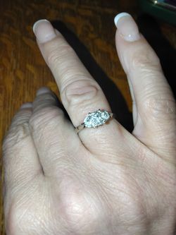 Custom Platinum and Diamond engagement ring with 2 white gold wedding bands