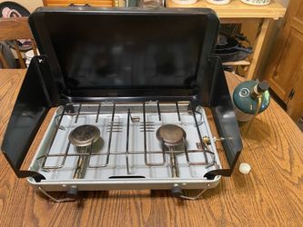 American Camper Model 1085 two-burner propane camp tabletop stove.