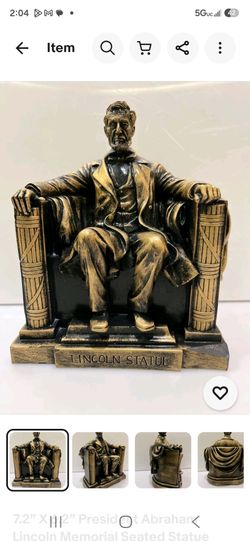 Gold painted Lincoln statue 9in by 5in