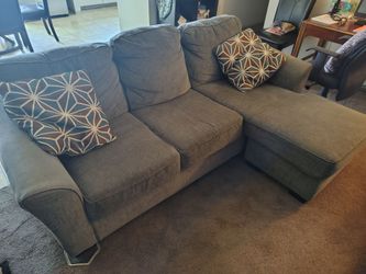 L-shaped sectional sofa grey color