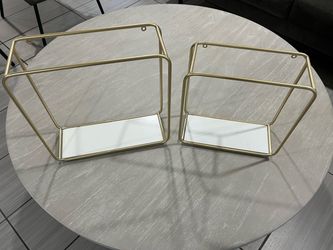 Gold wall shelves