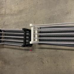 Two Metal Shoe Racks – White & Black, Fair Condition