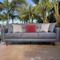 Dark Gray Tufted Living Spaces Sofa