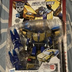 Transformers generations deluxe goldfire figure with comic book