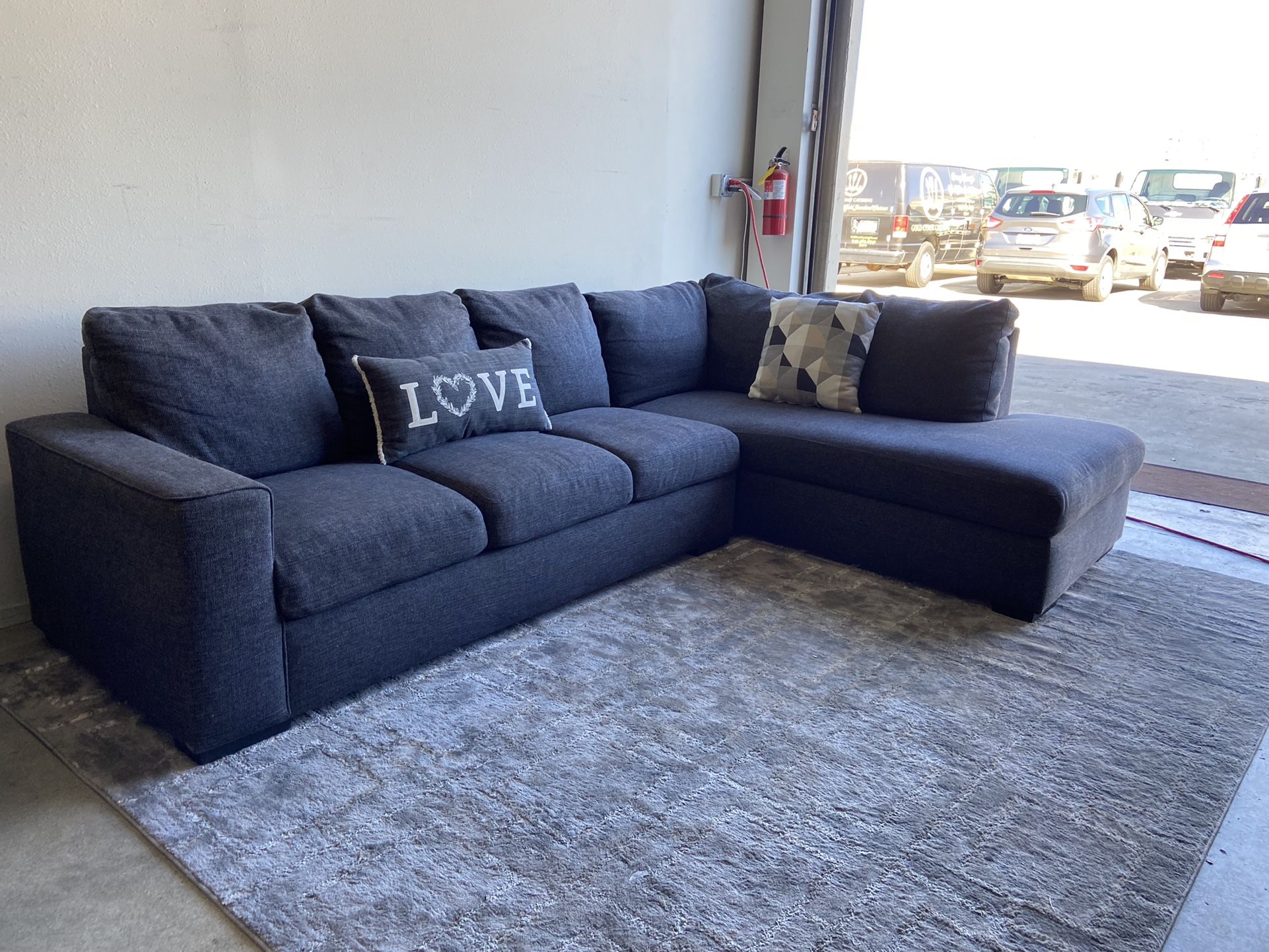Lucy Dark Grey 2 Piece Sectional from Living Spaces for Sale in