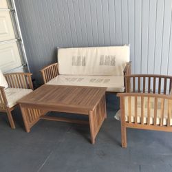 Outdoor patio wood sofa with chairs and coffee table 