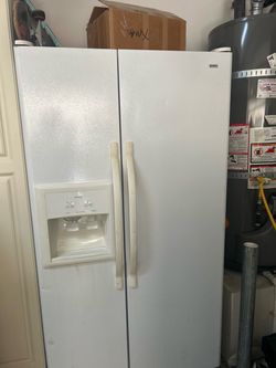 White Side-by-Side Refrigerator with Ice and Water Dispenser