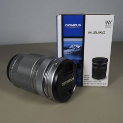 OLYMPUS M.Zuiko Digital 40-150mm ~ F4.0-5.6 R ~ Silver ~ Micro Four Thirds Systems ~ Zoom Lens - New In-Box!