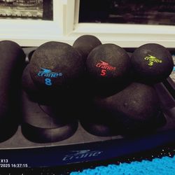Crane brand dumbbells with a storage tray. 