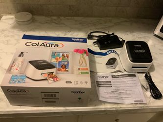 s a Brother ColAura Color Photo and Label Printer (Model VC-500W).