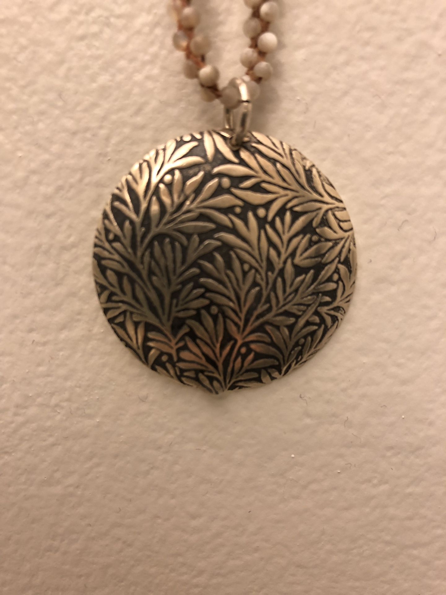 Silver Pendant on Baby Pearl Silk Threaded Necklace