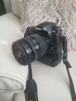 Nikon D300 S W/video Nikon Lens 28-200 motor drive.