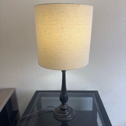 Black and cream table lamp with a modern design