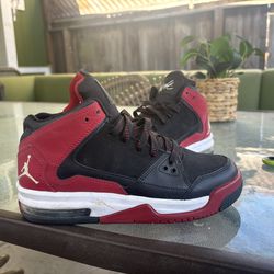 Nike Jordan Flight Origin athletic shoes in a black, white, and red