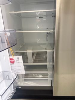 midea refrigerator new 36 width unit has dent door
