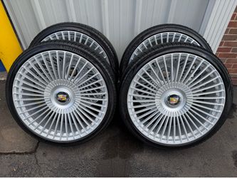 USED like new 26 inch spoke wheels with cadi floating caps