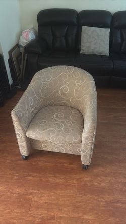Cushion chair on wheels