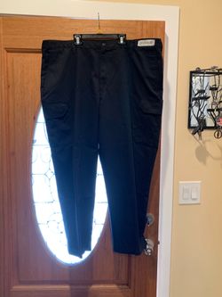 Lot Work pants with an extra leg pocket. Color: Black. Size: 44. Very good condition. 6 pairs available. Price: $10 for the lot.