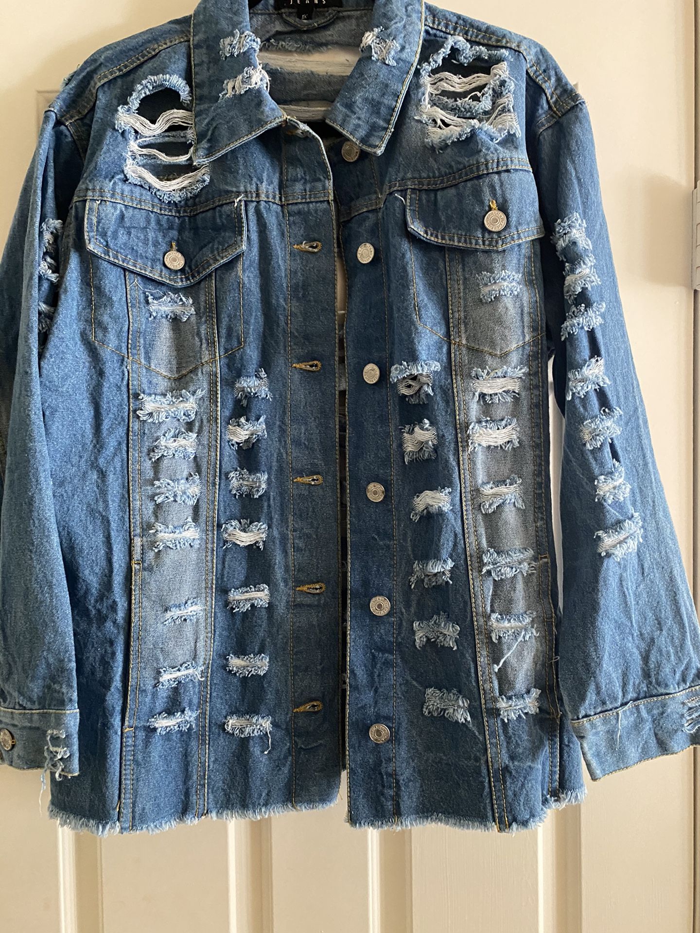 Women’s Distressed Jean jacket and he