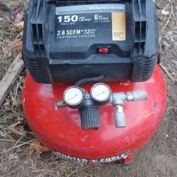 Porter-Cable 6-gallon pancake air compressor.  150 PSI,  2.6 SCFM at 90 PSI