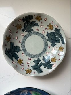 Vintage Ceramic Japanese Porcelain Plate with Wavy, Scalloped Rim and Stylized Botanical Patterns