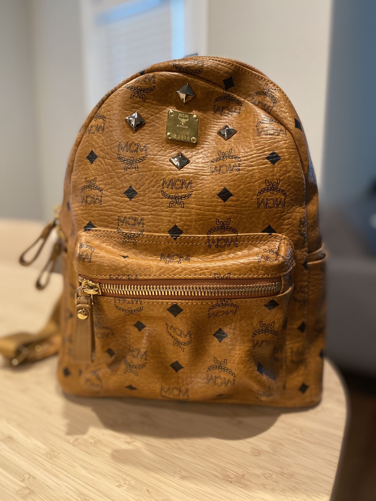 MCM Backpack / Monogrammed Studded Coated Canvas