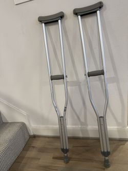 Pair Of Adjustable Crutches
