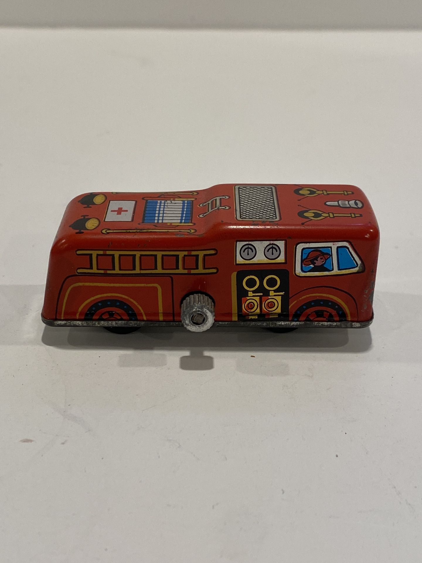 1970’s Vintage Toy Mini Tin Wind Up Fire Truck Working Condition 3” long