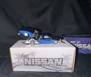 Hot Wheels 1986 Nissan Diecast Car Red line