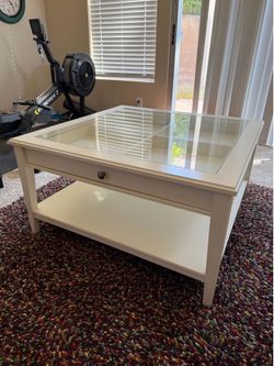 Glass display top coffee table