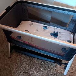 Baby Bed For New Born,also Over 100 Diapers,and A Baby Rocker