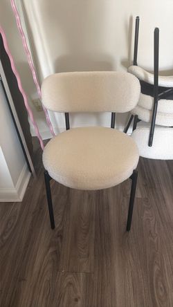 cream and black modern chairs