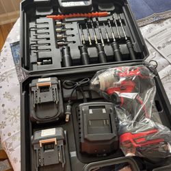 Impact Wrench 1/2” New with 2 batteries &charger with extra 25 pieces sockets& bits