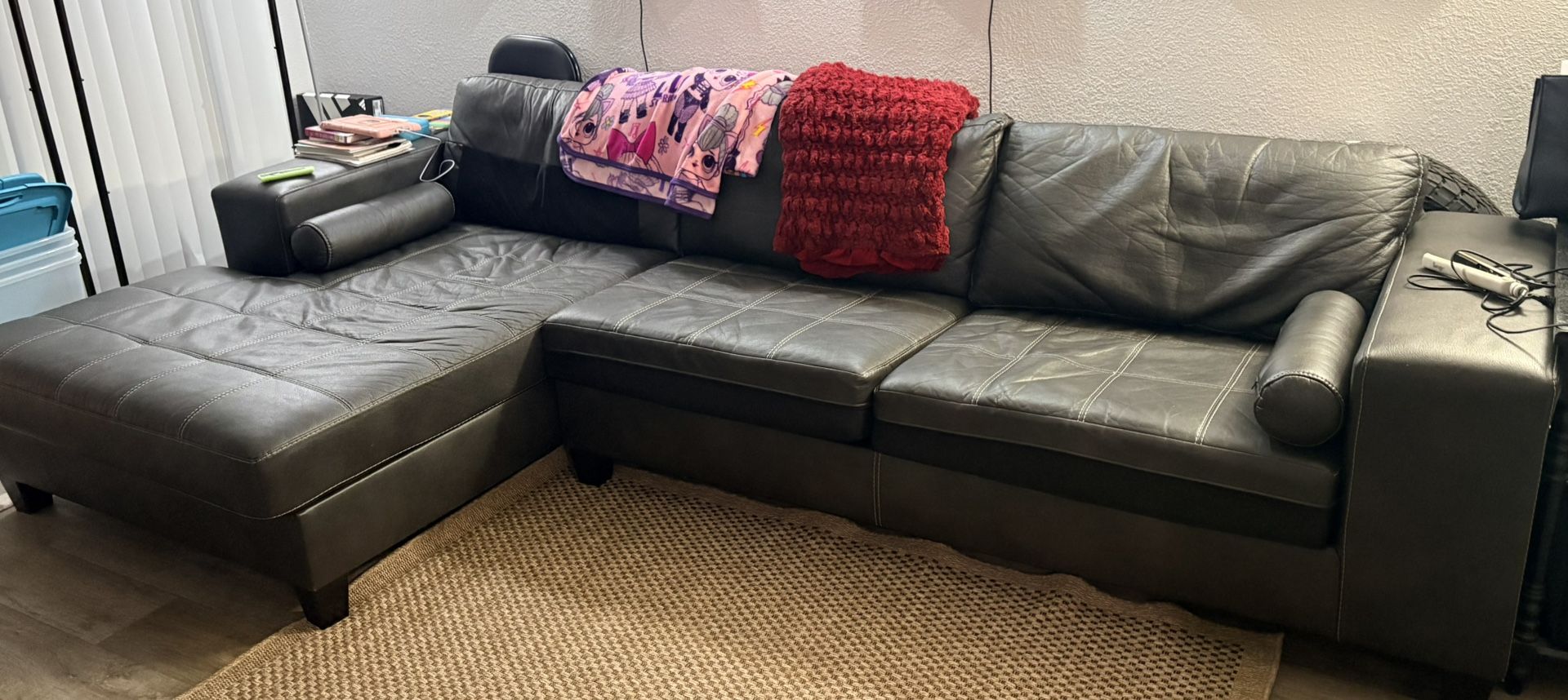 Ashley Furniture-Black faux leather Nokomis sectional sofa 