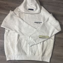 Light oat essentials hoodie size L-Xl