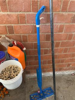 Blue and white mop handle