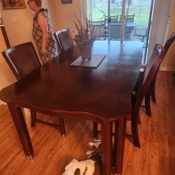 dining table and 3 stools