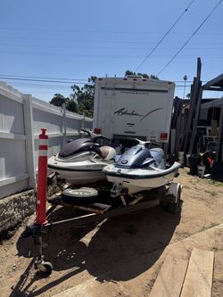2000 and 1998 wave runners with trailer 2000