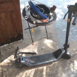 Nui.  E Scooter  Need A Charger  Will Let Go For 350 