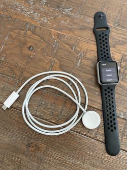 Apple Watch with Nike Sport Band and Charger