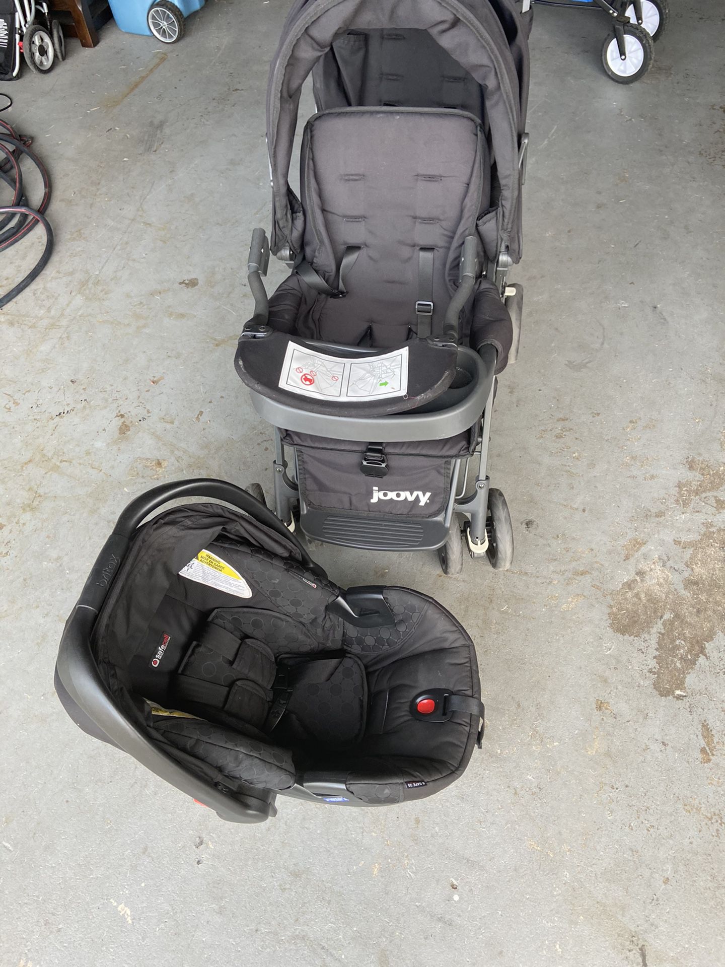 Joovy double stroller and Britox car seat