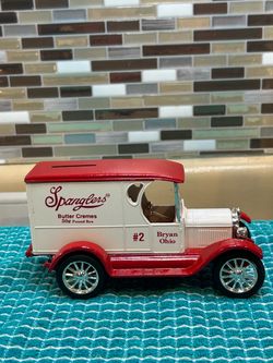 Vintage 1923 Chevrolet Spangler Candy Company die-cast metal coin bank