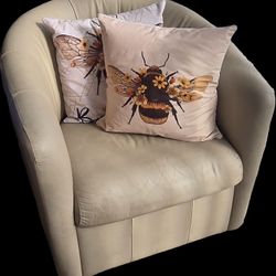 Pair Of Beige Leather Natuzzi Swivel Chairs 