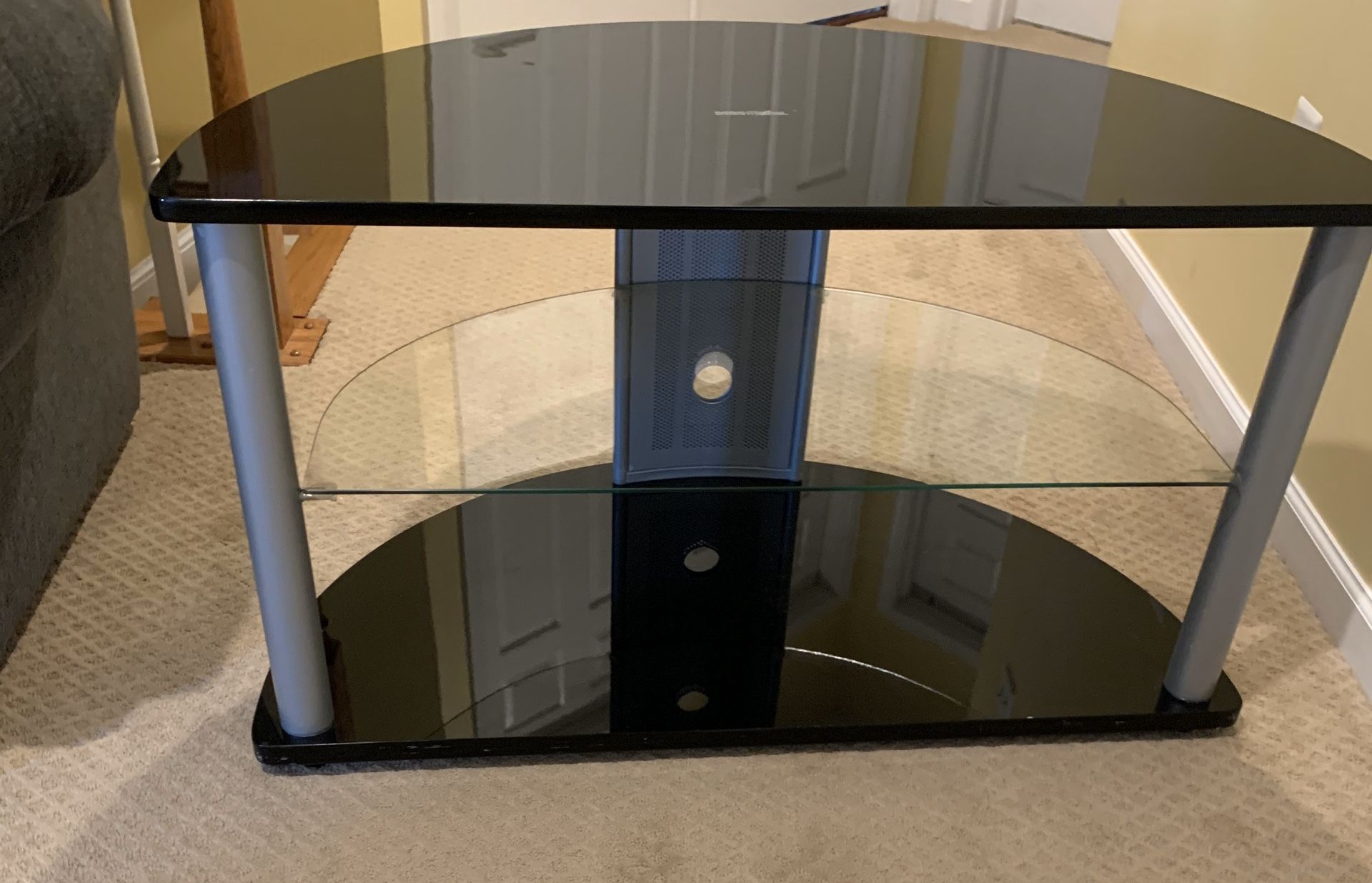 Black Tv stand with three shelfs semi circle Excellent condition