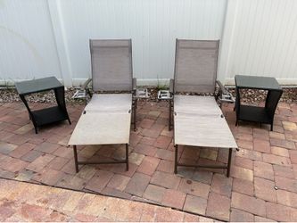 Out door pool loungers and side tables