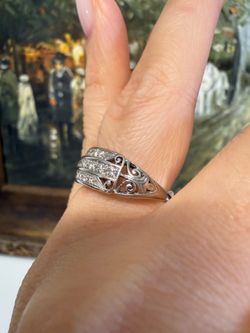 Platinum antique ring band with natural diamonds
