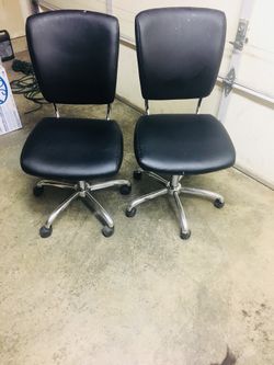 2 black rolling chairs