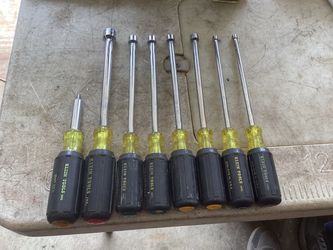 Seven Klein nut drivers and one multitool.. two 3/16, two 5/16 , to 11/32, and one half inch plus the what they told