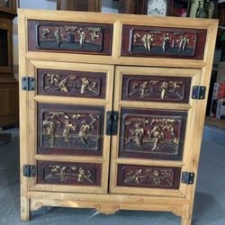 Antique Chinese Qing Dynasty Brick Red Lacquer Wood Storage Cabinet With Hand Carved Gilt Panels